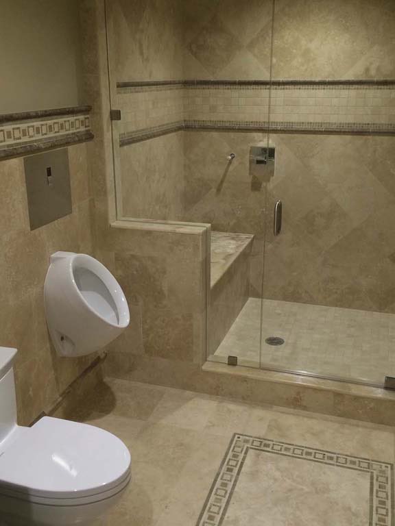 Executive Office Suite: Travertine shower