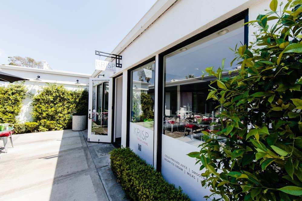 Krisp Juice Bar: Storefront and hedges